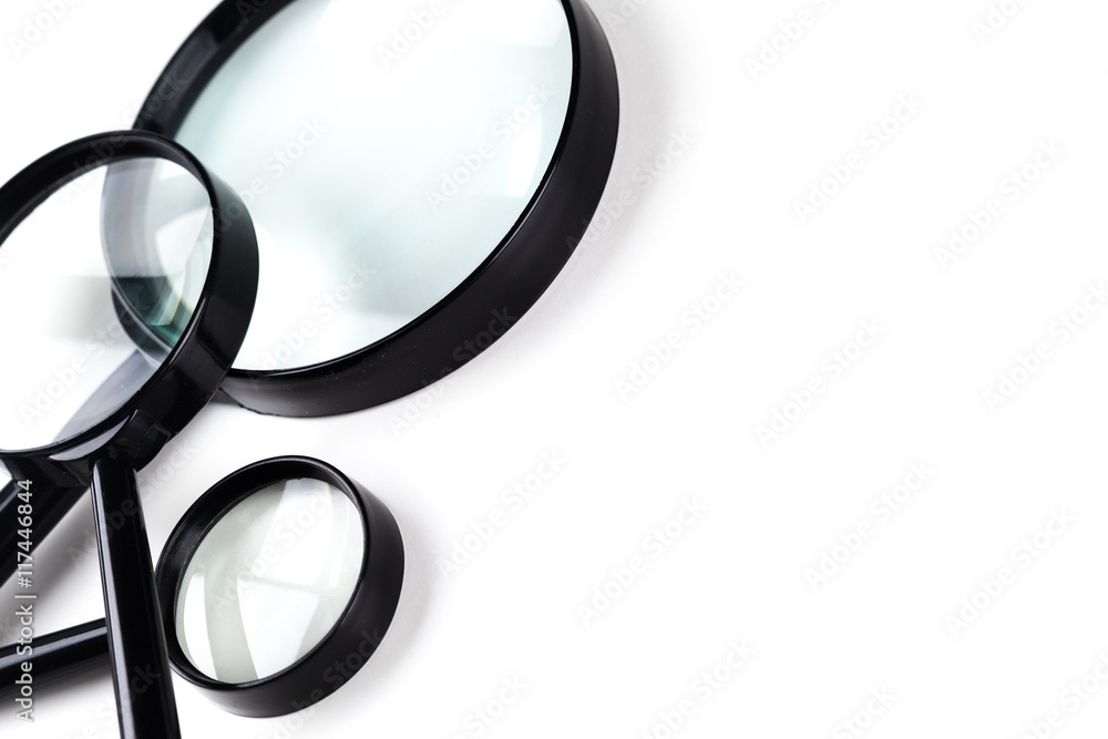 Three magnifiers over white Three magnifiers over white