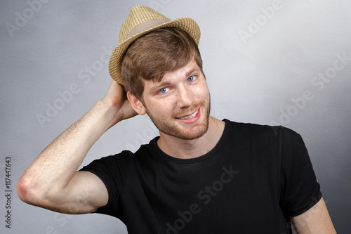 Sexy young man with hat