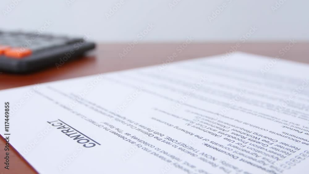 People puts the seal on the document. Close up People puts the seal on the document. Close up
