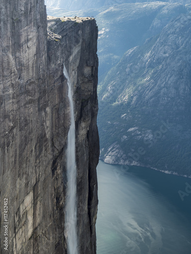 Norway, Forsand, Kjerag rocky plateau, waterfall and view to Lyse fjord photo