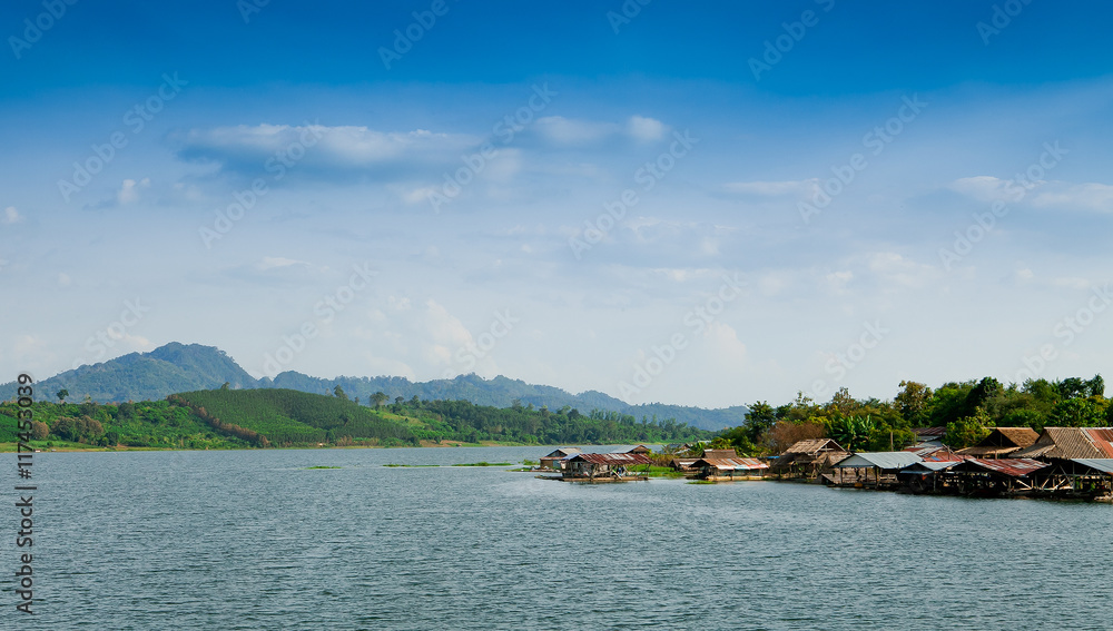 View of Samprasob River and Raft House near Saphan Mon wooden br
