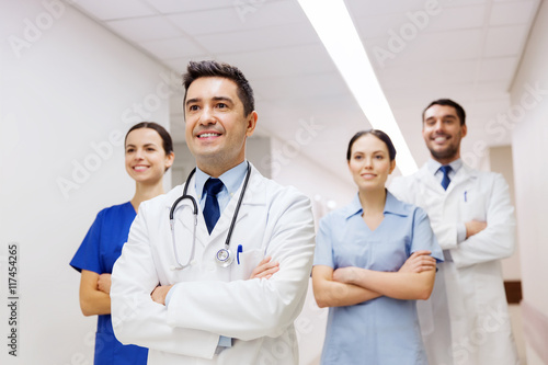 group of happy medics or doctors at hospital