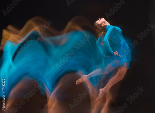 Fototapeta Naklejka Na Ścianę i Meble -  The art photo-emotional dance of beautiful blue woman