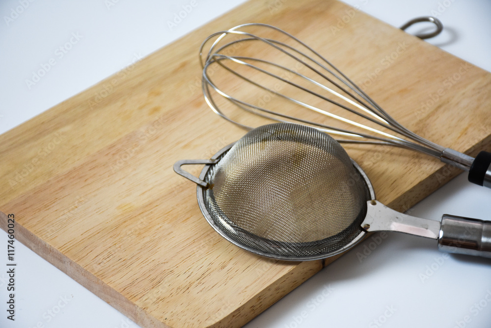 pan with utensils on the background pan with utensils on the background