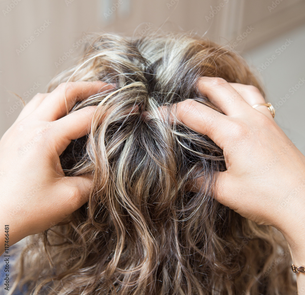 Naklejka premium head massage in a beauty salon