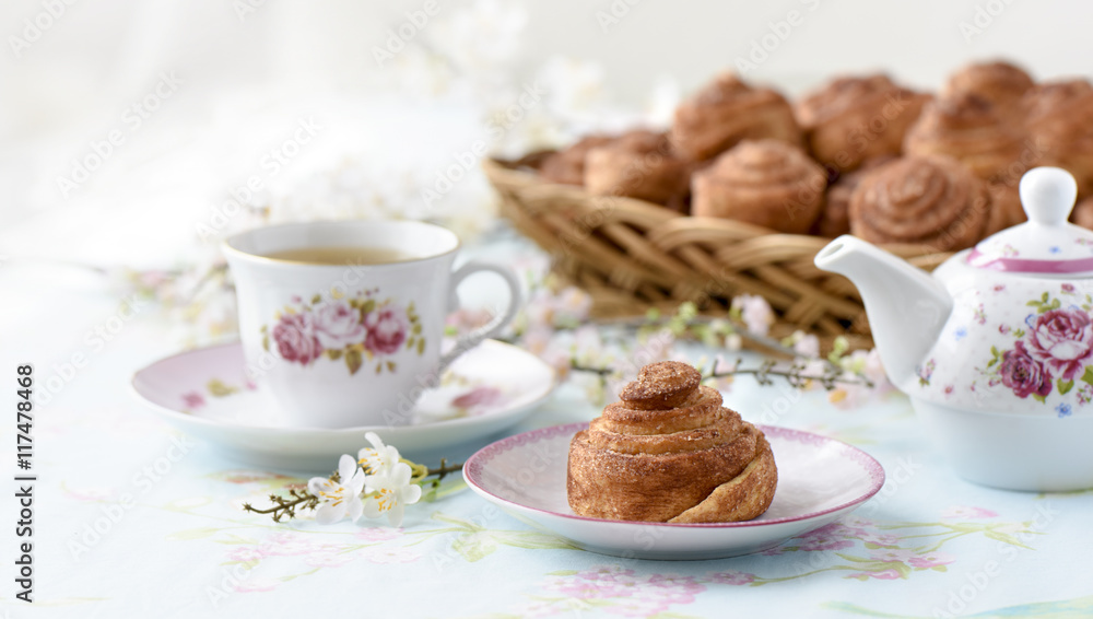 Homemade cinnamon buns cakes on a table Homemade cinnamon buns cakes on a table