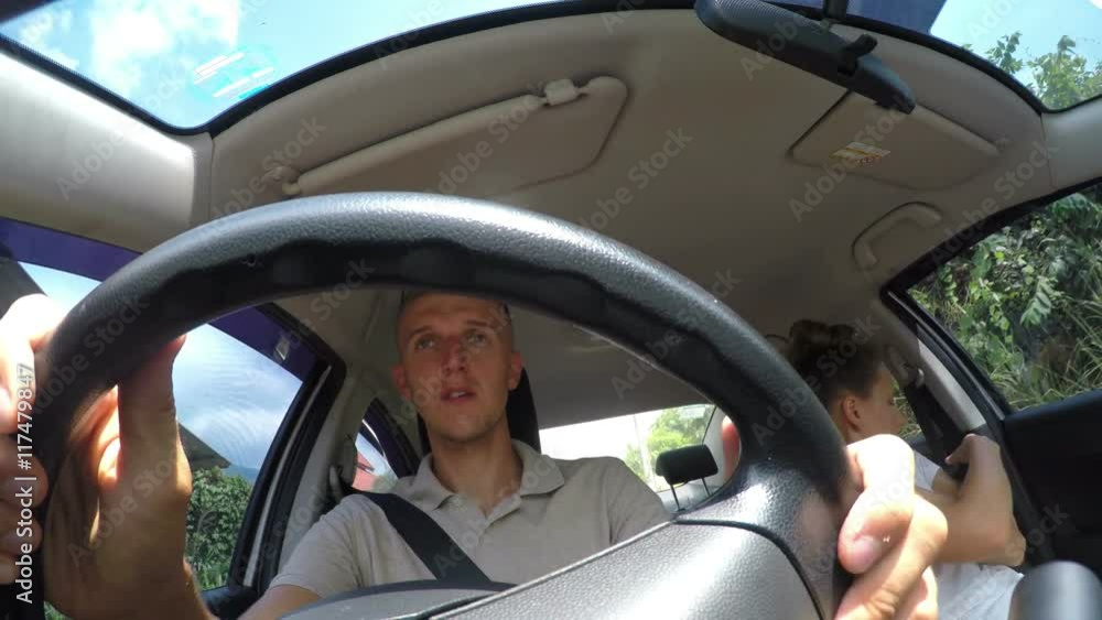 Young Сouple Buckling Seat Belts Driving in Car. 4K. Young Сouple Buckling Seat Belts Driving in Car. 4K.