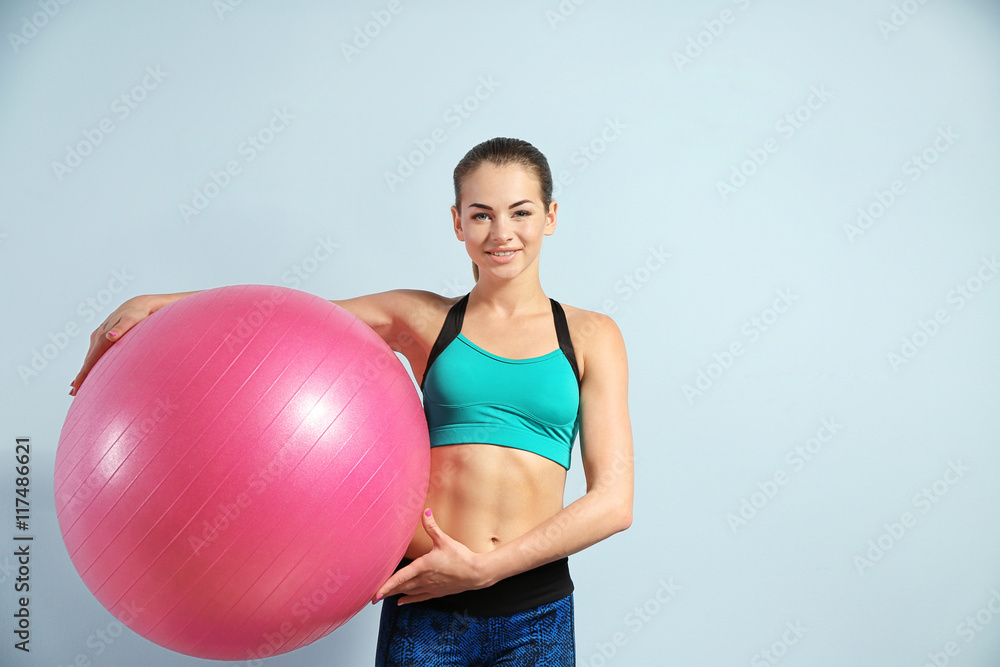 Girl with ball on blue background Girl with ball on blue background