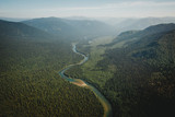 Top view of the taiga forest and river. The vast expanses of Eas