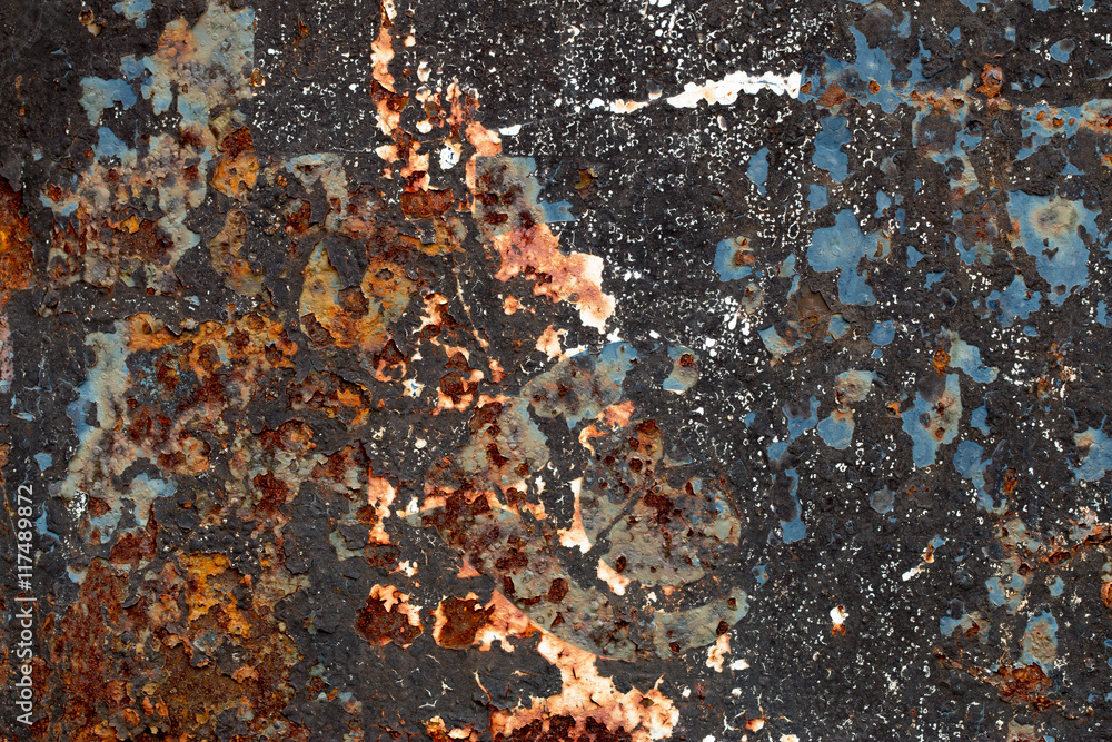 A background of peeling paint and rusty old metal A background of peeling paint and rusty old metal
