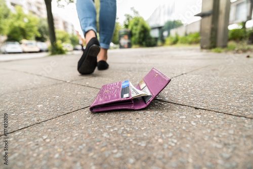 Close-up Of Woman Losing His Wallet