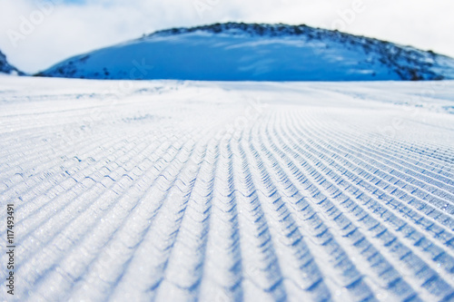 Freshly groomed ski slope in Molltaler Glacier ski resort, Austria. © tonovavania