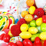 many different colorful candies and chewing gum