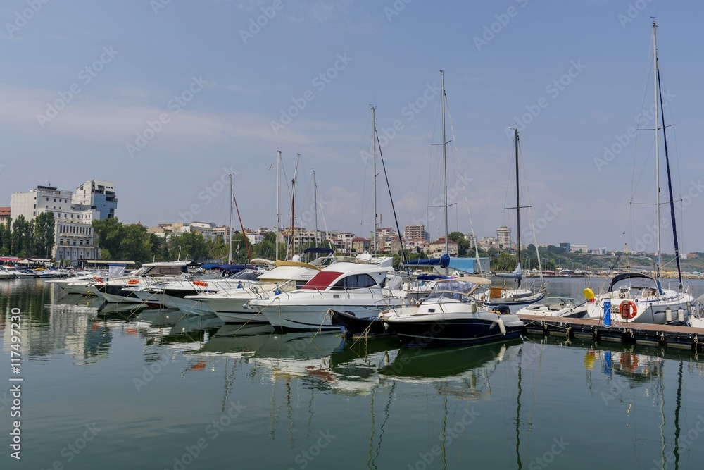 Small yachts moored in the Tomis harbor