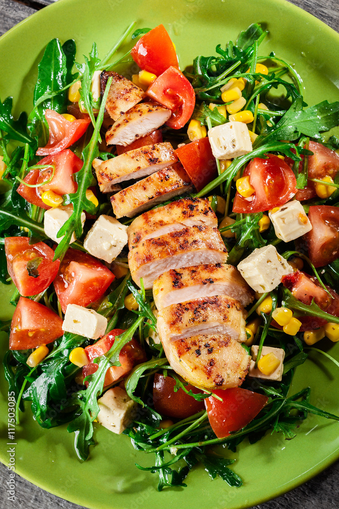 Fresh salad with chicken breast, arugula and tomato Fresh salad with chicken breast, arugula and tomato