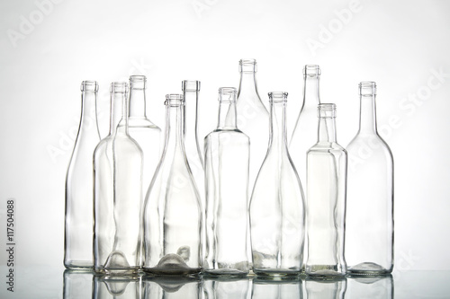 Empty bottles isolated over the white background