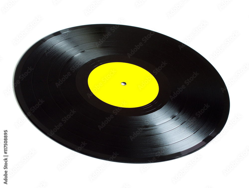 Black long-play vinyl records with yellow label isolated on white background. Side view closeup Black long-play vinyl records with yellow label isolated on white background. Side view closeup