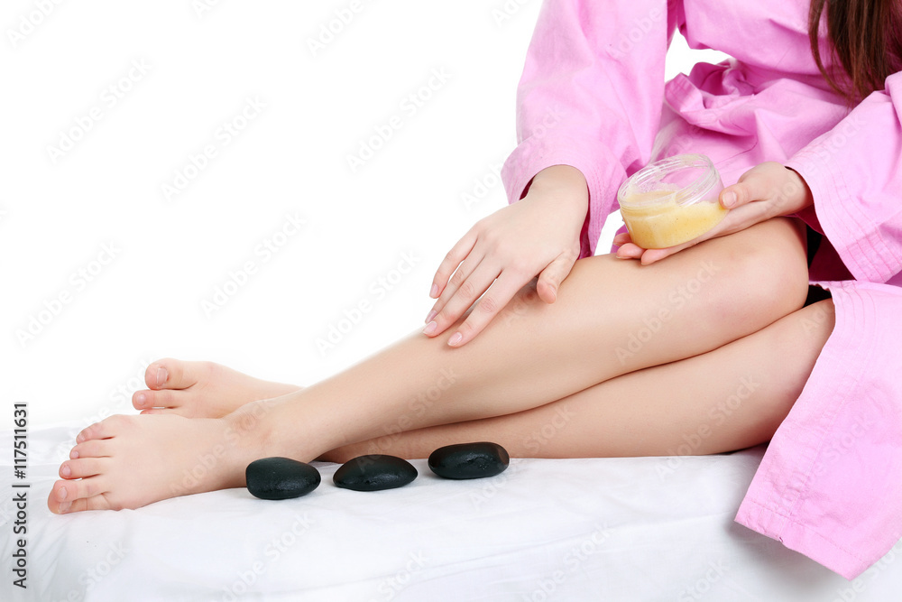 Spa Woman. Portrait of smiling young woman in towel in bathroom.