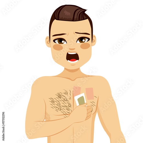 Young man waxing his chest to depilate body hair screaming in pain