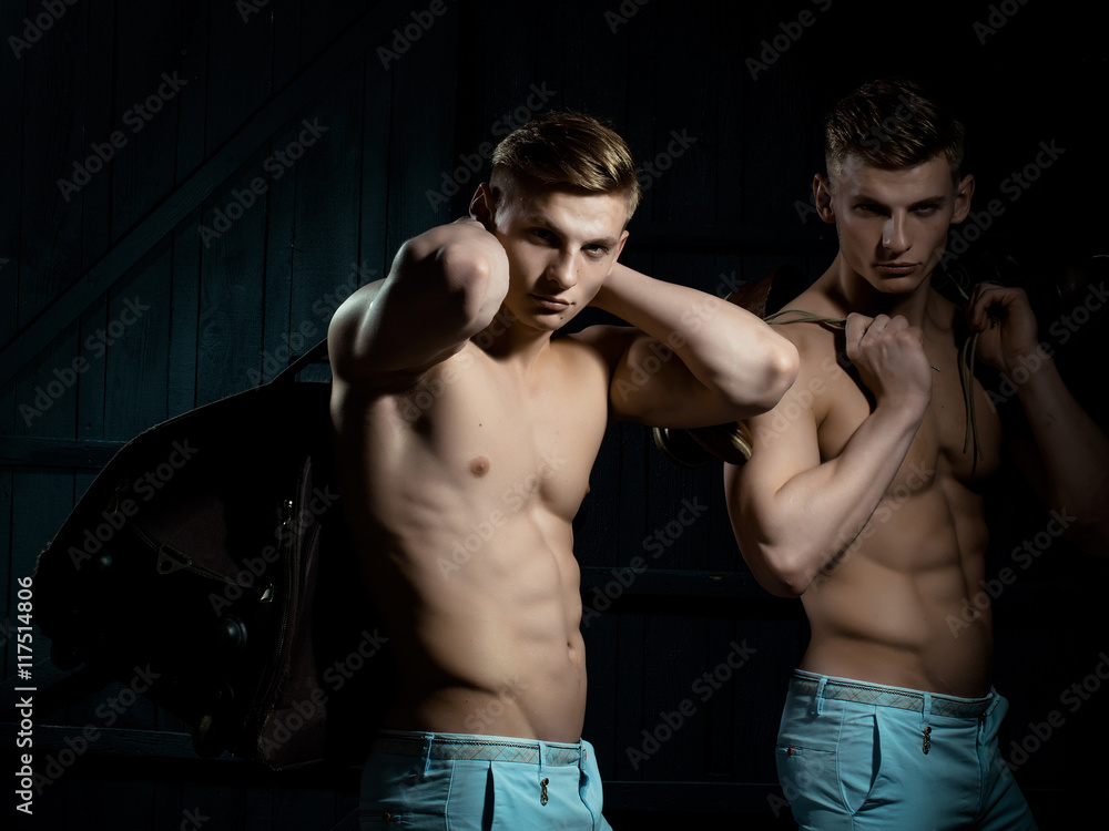 Twins with muscular torso