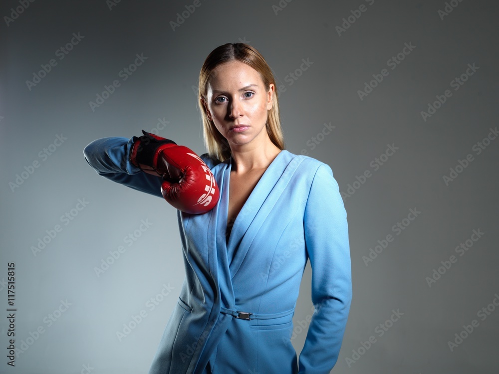 young blonde women posing with blue jacket and pant in studio young blonde women posing with blue jacket and pant in studio