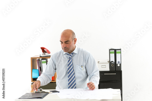 Fascinating employee in office sitting at desk