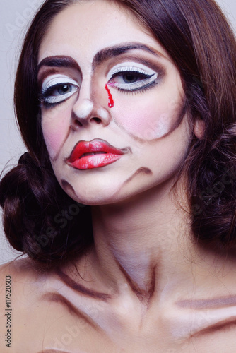 Fototapeta Naklejka Na Ścianę i Meble -  The girl with false eyelashes, make-up clown, mime image