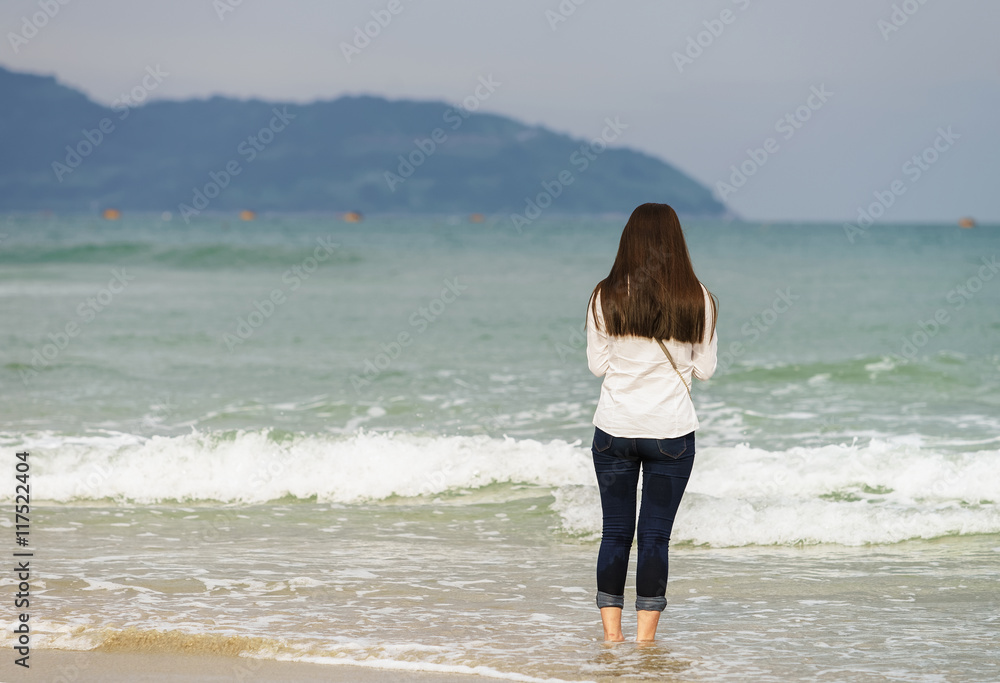 Young girl in the China Beach in Danang Vietnam