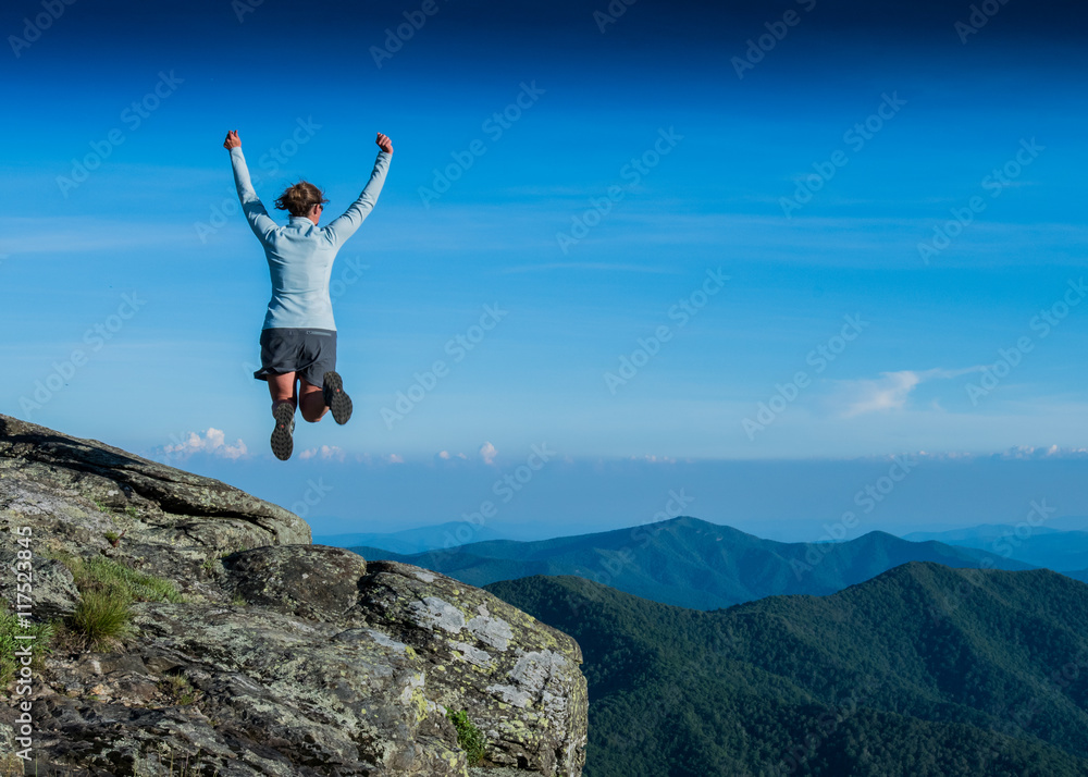 Leaping for Joy from a Rocky Overlook Leaping for Joy from a Rocky Overlook