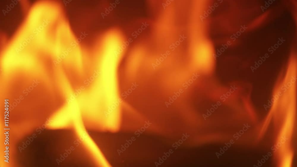 burning fire in fireplace with wood firewood in slow motion burning fire in fireplace with wood firewood in slow motion