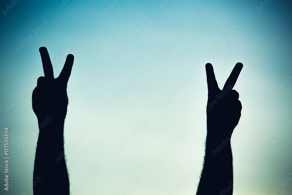Silhouette of a team of people hands shows gesture ok Silhouette of a team of people hands shows gesture ok