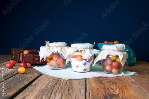 Preparation of plums with sugar in jars for winter