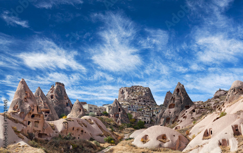 Uchisar castle and unique geological formations in Cappadocia, T photo