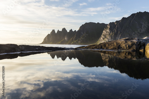 Reflections in the mountains of the island of senja in norway 