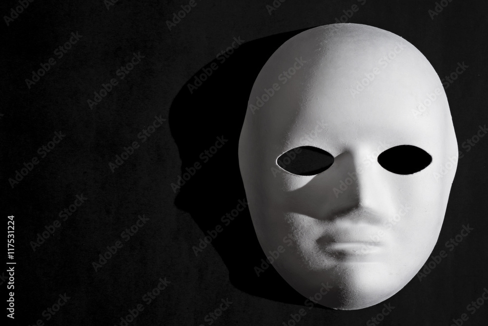 White Venetian mask and black background White Venetian mask and black background