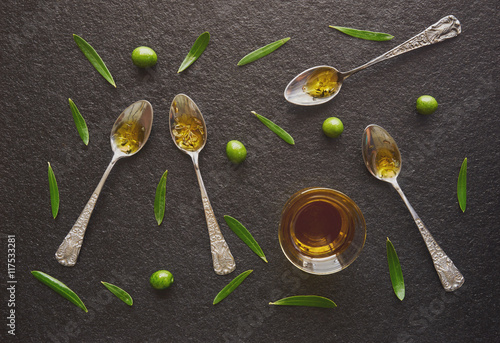 Olive oil in vintage spoons