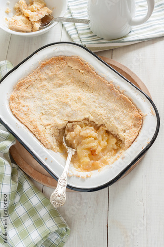 Apple crumble or cobbler stewed fruit with a crunchy pastry topping