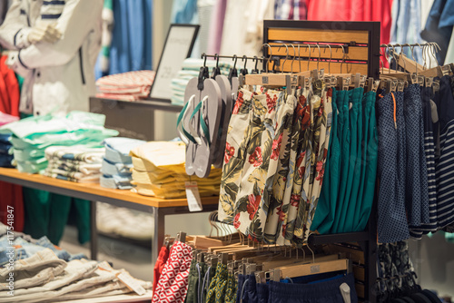 Clothing Store Interior With Summer Clothes On Foreground