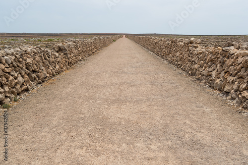 Path between stone walls