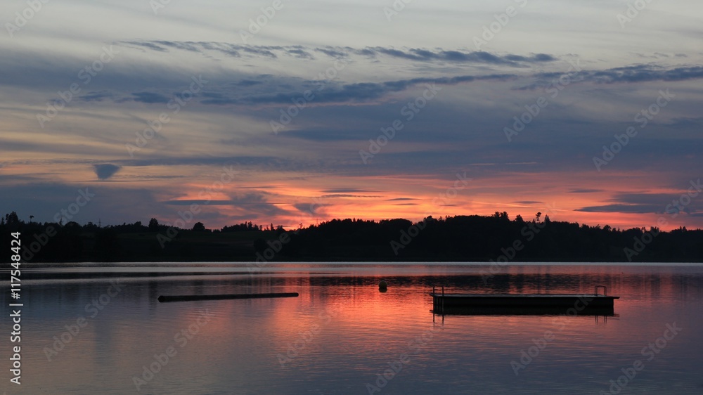 Fototapeta premium Colorful evening sky over Lake Pfaeffikersee