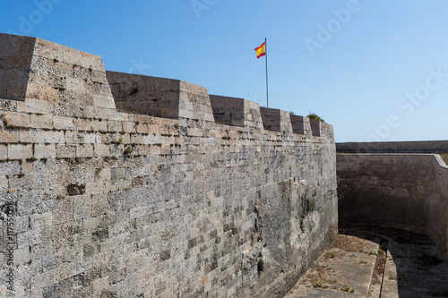 Mediterranean fort wall with its flag