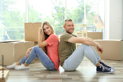 Beautiful couple sitting on...