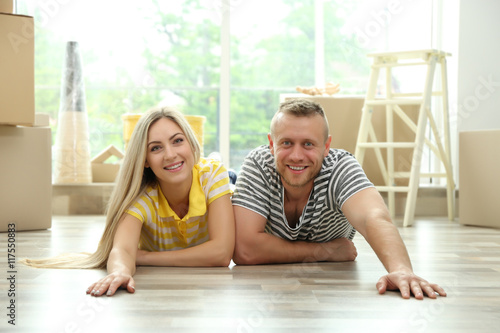 Beautiful couple lying on w...