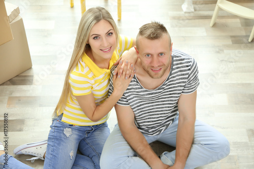 Beautiful couple sitting on...