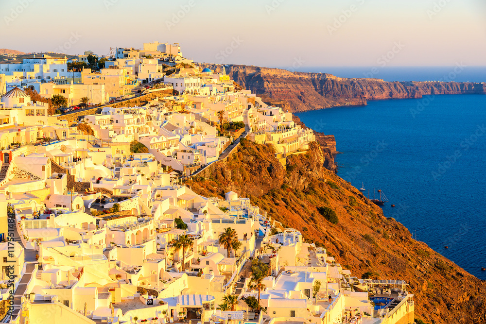 View of Firostefani village with sea in background at sunset time, Santorini island, Greece