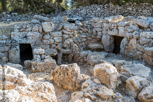 Entrance doors of prehistoric Menorcan houses photo