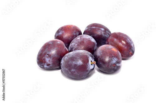 Fresh plums isolated on white