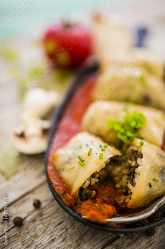 Stuffed cabbage with rice, mushroom and meat 
