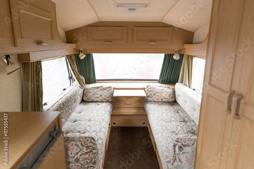 Inside of a caravn showing the seating area
