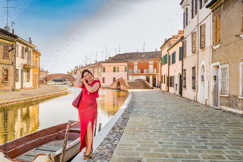 woman on the canals of ancient village